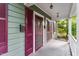 Inviting covered porch with classic railings and accents that offers a welcoming entrance to the home at 1314 Glendale Ave, Durham, NC 27701