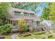 View of the rear of the home with elevated deck at 1314 Glendale Ave, Durham, NC 27701
