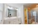 Bright bathroom featuring a double vanity, a separate shower and neutral decor at 1314 Rosepine Dr, Cary, NC 27519