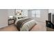 Comfortable bedroom with carpet, soft bedding, neutral colors, and natural light through a window at 1314 Rosepine Dr, Cary, NC 27519