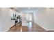 Modern kitchen with stainless steel appliances, white cabinets and island at 1314 Rosepine Dr, Cary, NC 27519