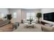 Cozy living area featuring modern furniture and neutral color palette at 1314 Rosepine Dr, Cary, NC 27519