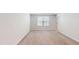 Clean, carpeted room featuring neutral paint and a bright window for natural light at 1314 Rosepine Dr, Cary, NC 27519