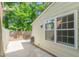Charming home features a cozy fenced backyard with concrete patio and lush landscaping at 1316 Garden Crest Cir, Raleigh, NC 27609