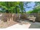 Outdoor living with a stainless steel grill and private fenced yard at 1316 Garden Crest Cir, Raleigh, NC 27609