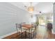 Cozy dining area featuring a modern light fixture and sliding glass doors at 1316 Garden Crest Cir, Raleigh, NC 27609