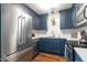 The kitchen features stainless steel appliances, subway tile, and plentiful storage at 1316 Garden Crest Cir, Raleigh, NC 27609