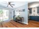 Inviting living room boasts new floors, updated kitchen view and open floor plan at 1316 Garden Crest Cir, Raleigh, NC 27609