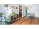 Inviting living room with sleek hardwood floors, modern furnishings, and decorative accents at 1316 Garden Crest Cir, Raleigh, NC 27609