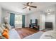 Inviting living room with hardwood floors, a ceiling fan, and natural light at 1316 Garden Crest Cir, Raleigh, NC 27609