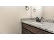 Bathroom vanity with granite countertops and bronze faucet fixtures at 134 Royal Ave, Selma, NC 27576