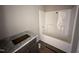 Bathroom featuring granite countertops, a sink, and a shower and tub combo at 134 Royal Ave, Selma, NC 27576