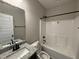 A bathroom featuring a shower/tub combination and granite-topped vanity at 134 Royal Ave, Selma, NC 27576
