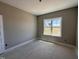 Bright bedroom with a large window offering plenty of natural light at 134 Royal Ave, Selma, NC 27576