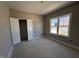 Bright bedroom with a window offering plenty of natural light, walk in closet at 134 Royal Ave, Selma, NC 27576