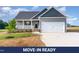 Charming single-Gathering home featuring a two-car garage and a well-manicured lawn at 134 Royal Ave, Selma, NC 27576