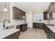 Well-equipped kitchen featuring granite countertops and ample storage space at 134 Royal Ave, Selma, NC 27576