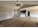 Open-concept living room featuring modern finishes and seamless transitions to the kitchen area at 134 Royal Ave, Selma, NC 27576