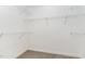Spacious walk-in closet with wire shelving at 134 Royal Ave, Selma, NC 27576