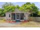Charming home featuring beautiful trees and landscaping, offering great curb appeal at 1429 Hudson Ave, Durham, NC 27705