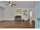 Spacious living room with hardwood floors, fireplace, and abundant natural light at 1429 Hudson Ave, Durham, NC 27705