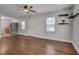 Bright living room featuring hardwood floors and windows, providing ample light at 1429 Hudson Ave, Durham, NC 27705