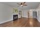 Living room with hardwood floors and a fireplace at 1429 Hudson Ave, Durham, NC 27705