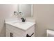 Bright bathroom with modern vanity, chrome fixtures, and a toilet with soft closing lid at 1481 Carolina Dr, Sanford, NC 27332