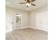 Spacious bedroom with ceiling fan and ensuite bathroom provides comfort and convenience at 1481 Carolina Dr, Sanford, NC 27332