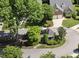 High angle aerial view featuring homes with lush green trees in a suburban neighborhood at 156 Yorkchester Way, Raleigh, NC 27615