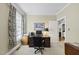 Home office with large window, desk, and neutral color scheme, perfect for remote work at 156 Yorkchester Way, Raleigh, NC 27615