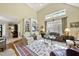 Spacious living room with vaulted ceilings, fireplace, and built-in shelving, open to other living areas at 156 Yorkchester Way, Raleigh, NC 27615