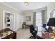 Functional office space featuring a desk, seating, and closet, with natural light at 156 Yorkchester Way, Raleigh, NC 27615