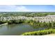 Aerial view showcasing community featuring lake, homes, and green space at 1641 Silo Ridge Dr, Wake Forest, NC 27587