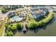 Aerial view of community featuring a pool, clubhouse, lake, and residential buildings at 1641 Silo Ridge Dr, Wake Forest, NC 27587