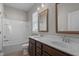 Bathroom featuring a double vanity, white counters, and a tub with shower at 1641 Silo Ridge Dr, Wake Forest, NC 27587