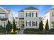Charming two-story home featuring gray siding, dark shutters, and a landscaped front yard at 1641 Silo Ridge Dr, Wake Forest, NC 27587