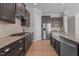 This beautiful kitchen features granite countertops, stainless steel appliances and custom cabinets at 1641 Silo Ridge Dr, Wake Forest, NC 27587