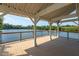 Spacious covered patio with lake view, perfect for outdoor entertaining and relaxation at 1641 Silo Ridge Dr, Wake Forest, NC 27587