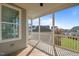 Relaxing screened porch with ceiling fan, wooden floors, and neighborhood views at 1641 Silo Ridge Dr, Wake Forest, NC 27587