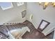 Staircase and foyer featuring hardwood flooring, natural light, and a decorative chandelier at 1808 Capstone Dr, Durham, NC 27713