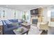 Inviting living room features a fireplace, comfy seating, and natural light at 1808 Capstone Dr, Durham, NC 27713