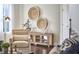 Cozy living room featuring an armchair, side table, and decoratively adorned walls at 1808 Capstone Dr, Durham, NC 27713