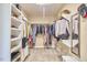Well-organized walk-in closet with shelving and ample storage space at 1808 Capstone Dr, Durham, NC 27713