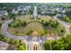 Aerial view of a well-maintained community park with lush greenery and inviting green spaces at 1908 Woodsdale Dr, Durham, NC 27703