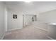 Hallway leading to bedroom, bathroom, and extra storage space at 1908 Woodsdale Dr, Durham, NC 27703