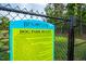 Dog park rules posted for the community at Brightleaf at the Park at 1908 Woodsdale Dr, Durham, NC 27703