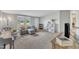 Inviting living room offers natural light, a cozy gray sofa, and neutral decor at 196 Marlin Ln, Smithfield, NC 27577