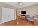 Spacious bedroom with hardwood floors, closet, desk and an open layout at 205 Forbes Rd, Wake Forest, NC 27587