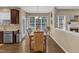 Dining room with large windows and wood flooring at 205 Forbes Rd, Wake Forest, NC 27587